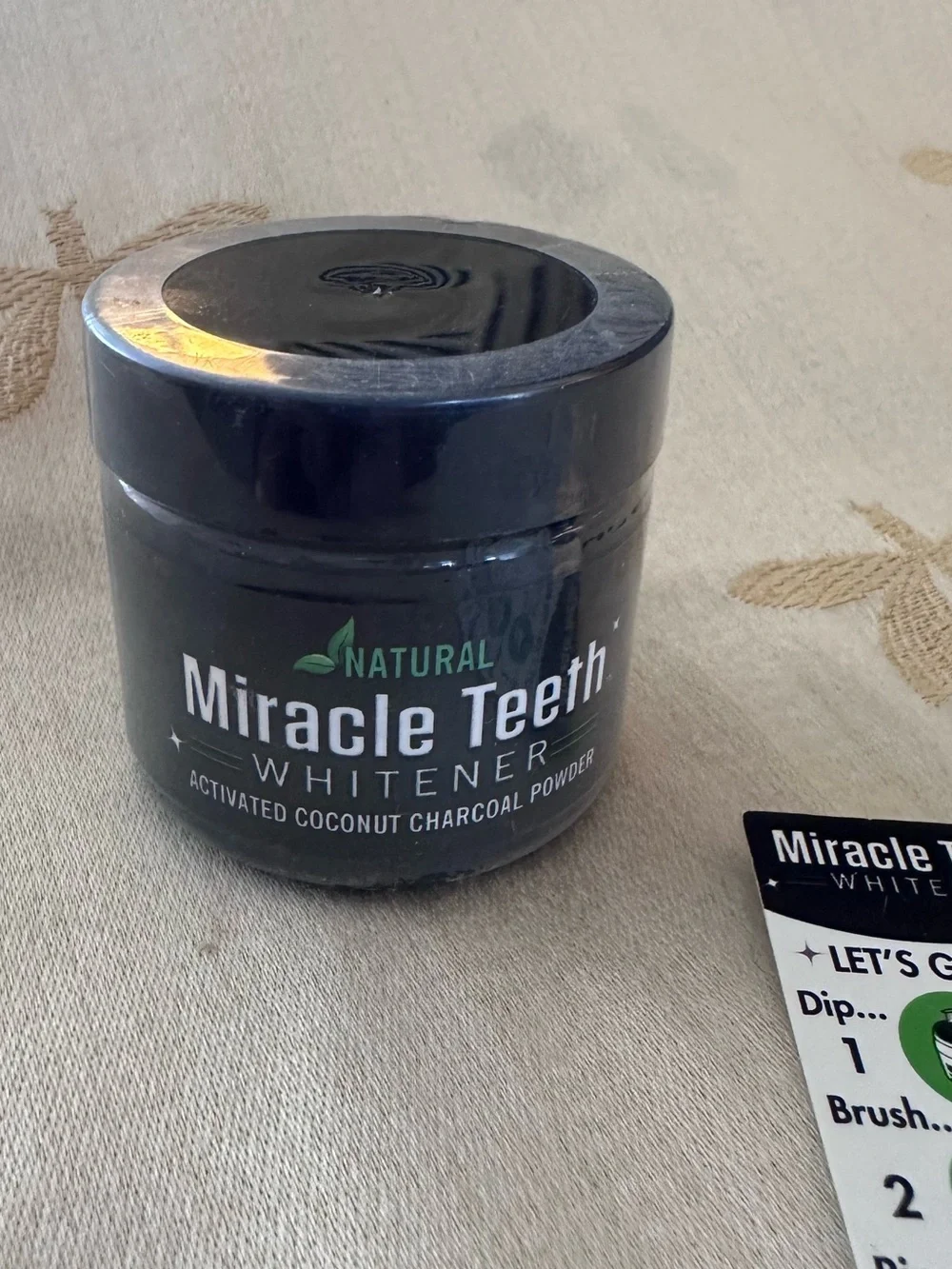 MIRACLE TEETH WHITENER ACTIVATED COCONUT CHARCOAL POWDER.